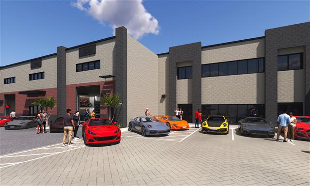 Luxury sports cars outside The Stack auto lofts